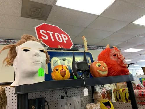 Masks, Halloween collectibles, and unusual vintage pieces